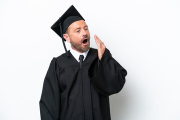Middle age university graduate man isolated on white background yawning and covering wide open...