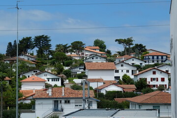 Saint-Jean de Luz, France - July 8th, 2023: The facades of the building of Saint-Jean de Luz in the...