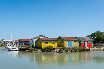 Fototapeta na wymiar Ile d’Oléron (Charente-Maritime, France), les cabanes colorées du port de Château d'Oléron