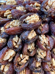 close up of dried date fruits full with walnuts