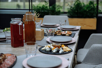 Festive table served with meat dishes and salads