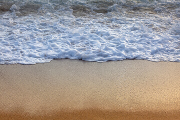 wave on the sandbank at the beach