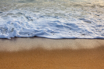 wave on the sandbank at the beach