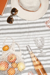 Summer holiday party, vacation, travel concept. Summer flat lay on beach towel as background. Top...