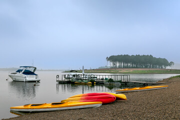 Fototapeta premium Boat dock serving tourists on the lake at Flamingo resort in Dai Lai district, Vinh Phuc province, Vietnam