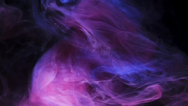 Colorful Ink Clouds Mixing. Paint Dispersing In Water. Slow Motion. Black Background. slow motion 4K