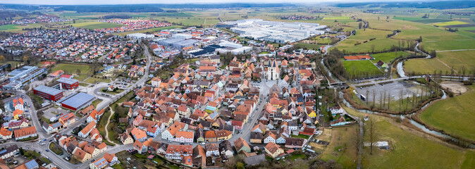 Aerial of the old town of Nuits-Saint-Georges in France on a cloudy morning in early spring.