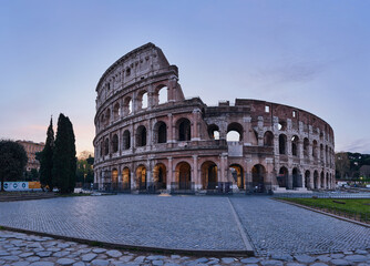 The Colosseum (Colosseo, Anfiteatro Flavio)  at dawn in Rome, Italy
