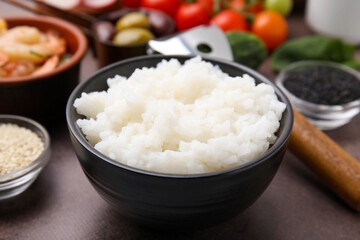 Ingredients for poke bowl on grey table, closeup