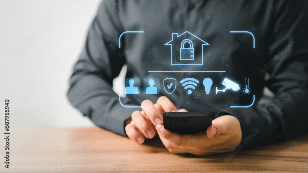 Poster Adult man controlling technology AI smart home devices using a smartphone with launched application in the living room. Iot smart home automation app concept.