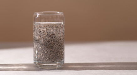 Water with chia seeds, close-up, texture, background, place for text, banner