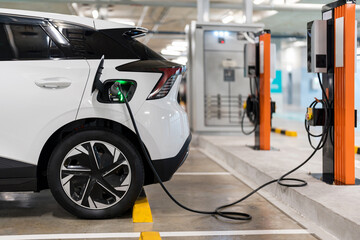 Charging of electric cars at a charging station, automotive industry, transportation