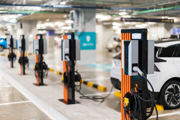 Charging of electric cars at a charging station, automotive industry, transportation