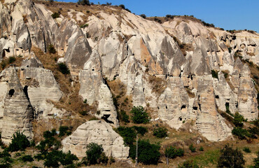 Mushroom-shaped rocks (also called the Fairy Chimney) with caves inside in the Goreme National Park in Cappadocia, Turkey