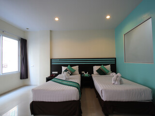 Fototapeta na wymiar Hotel Room Decorated single bedroom with bed nice colours