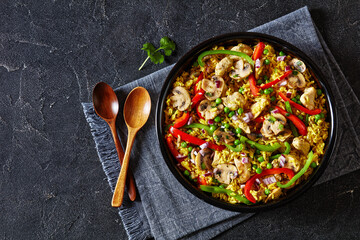 chicken mushroom paella with pepper, green peas