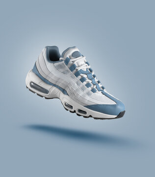 White sneaker with light blue accents on blue gradient background, men's fashion, sport shoe, air, sneakers, lifestyle, concept, product photo, levitation concept, street wear, trainers