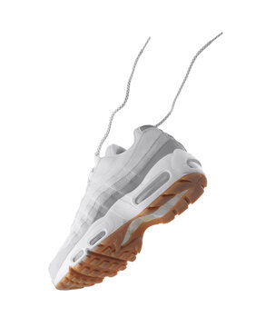 Gray sneaker with light yellow accents on a white isolated background, men's fashion, sport shoe, air, sneakers, lifestyle, concept, product photo, levitation concept, street wear, trainers