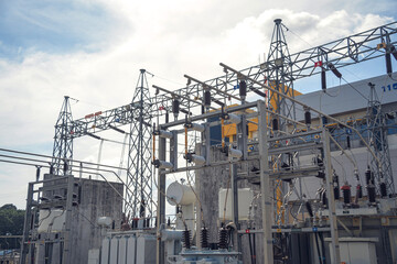 Fototapeta na wymiar High voltage electric power plant current distribution substation