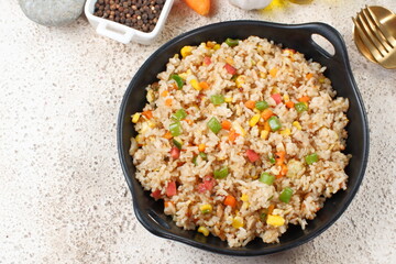 Fried rice with vegetables in a plate, Asian food