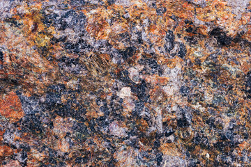Granite natural rock surface texture close up