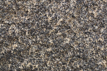 Granite natural rock surface texture close up