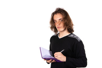 Young attractive student posing in the studio.