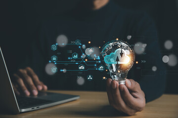 Business  hand using lamp with virtual popup icon of cloud computin Storage and data transfer Cloud network , Cloud technology. Networking and internet service concept.