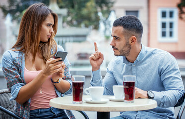 Jealousy. Problems in love relationships. Young couple in quarrel - obrazy, fototapety, plakaty