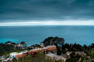 Summer in Taormina, Sicily. Panoramic view from above. Where the sea meets the city