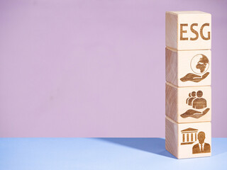 Environmental, Governance and Social symbols on wood blocks as concept of ESG principles