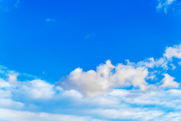 Naklejka na ściany i meble Sky blue background. Blue sky background with clouds.