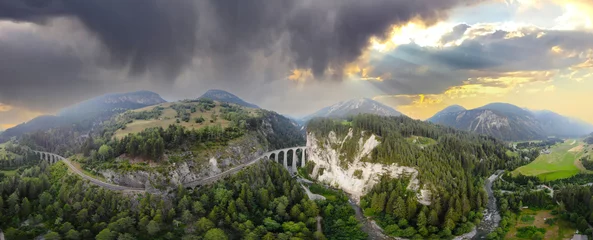 Wallpaper murals Landwasser Viaduct Aerial view of the famous red train on the Landwasser Viaduct, Switzerland.