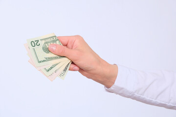 Female hand holds american dollars