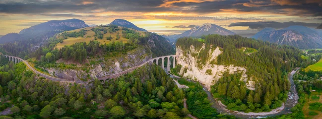 Foto op Plexiglas Landwasserviaduct Aerial view of the famous red train on the Landwasser Viaduct, Switzerland.