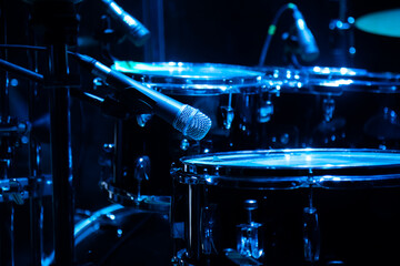 drum set on stage in a concert hall. Large-sized photo with soft change selectivity. Vintage live...