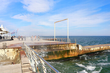Seascape with the pier on a sunny day in Odessa, Ukraine