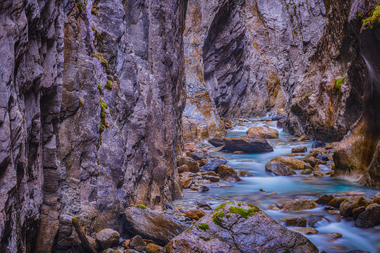 glacier river inside the mountain cave