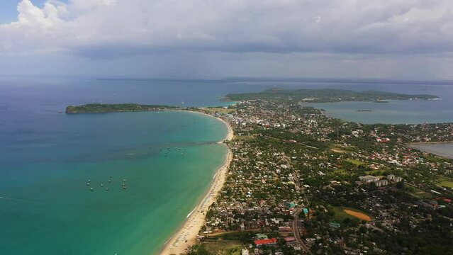 The tourist town of Trincomalee with hotels and a beach. Sri Lanka.