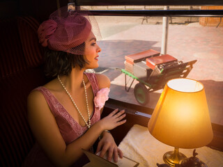 Flapper dress 1920 lady at train window