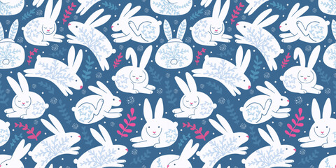Lovely white rabbits on blue background. Nice seamless pattern with winter atmosphere and snow. Pink decorative elements - leaves. Funny animals jumping and running. Sweet vector art with hares