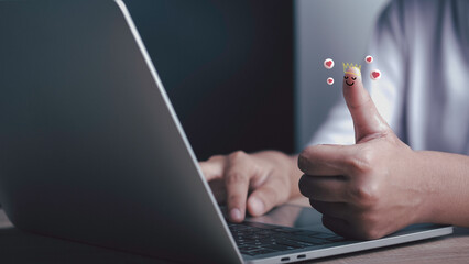 Businessman and show happy smiley face on thumb up with red heart emotion and crown, Good satisfaction feedback rating to service experience. Positive Review.Client Satisfaction Surveys,review.