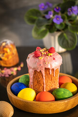 The Symbols of Christian Easter are the Easter cake and painted eggs. Selective focus.