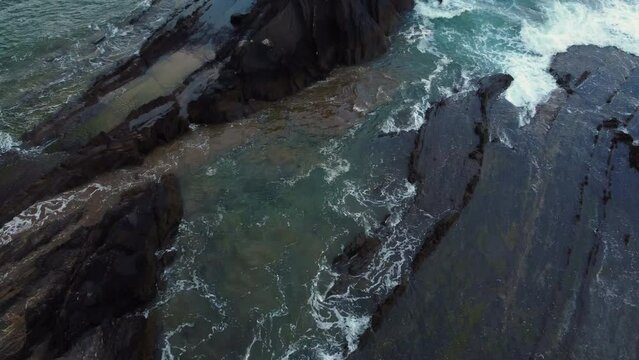Aerial view of Rocky coastline and Flysch on the beach Saturraran, Ondarroa, Spain. High quality 4k footage.