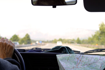 Fototapeta premium Motorway - Road and map - viewed from the driver