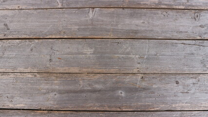 Fototapeta na wymiar Gray wooden planks background. Backdrops of wooden planks.