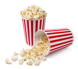 Two striped buckets of popcorn isolated on a white background.