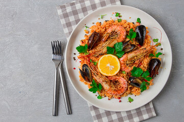 Seafood paella, shrimp and mussels risotto, rice, homemade, top view, no people,