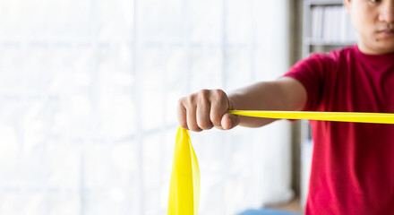 Male chiropractor, physiotherapist or orthopedist examining a patient suffering from scoliosis or...