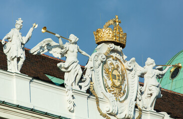 Obraz premium Vienna's Historic Building Exterior With A Coat Of Arms